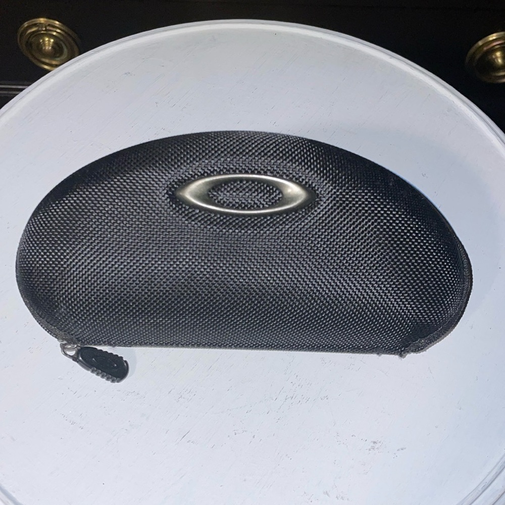 Oakley glasses case with dust bag for glasses